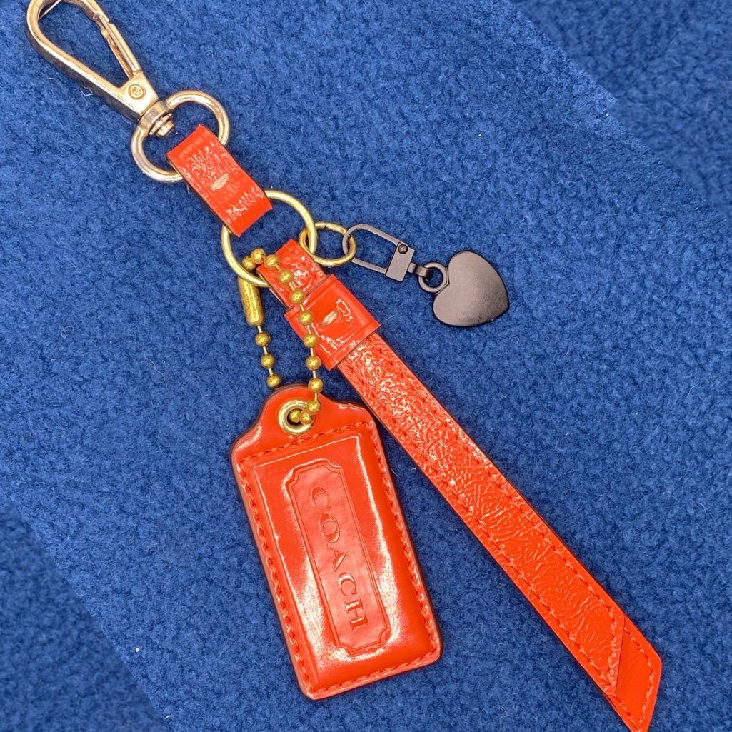 Coach Accessories | Authentic Coach Charm Hang Tag With Generic Heart Charm And Generic Clasp | Color: Orange | Size: Measurements In Photos