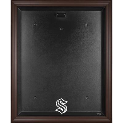 Vitrine mit Logo-Trikot im braunen Rahmen von Seattle Kraken Image