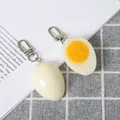 Portachiavi con uovo sode Simulazione Borsa con uovo Portachiavi Ciondolo Modello alimentare divertente Portachiavi per auto in metallo per donna Ragazza Decorazione fai da te