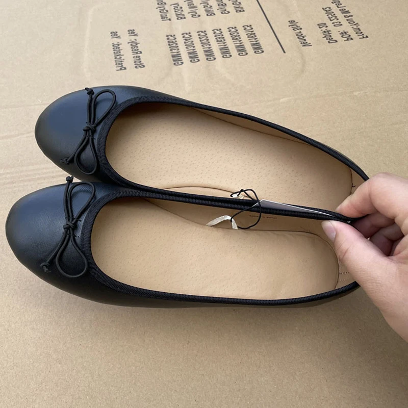 2026 Frühling elegante Ballerinas mit Schleife, klassischer Schuh, runde Zehen, bequeme Slip-On-Damenmode, Slipper, Leder-Pantoletten-Schuhe