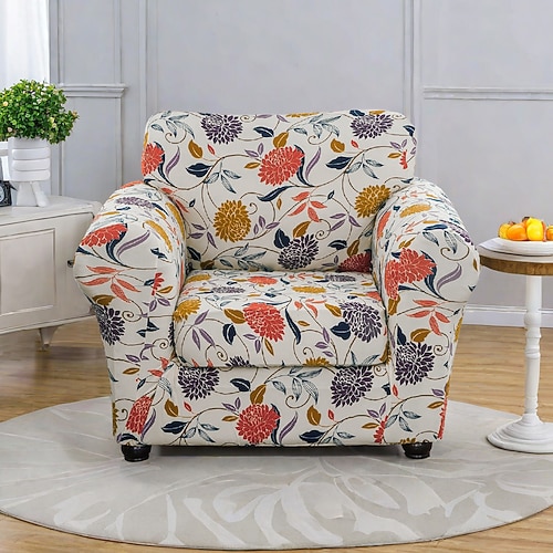 Stretch-Sesselbezug mit Blumenmuster. Elastischer Schonbezug mit Blumenmuster für einen stilvollen und sicheren Sitz. Ideal zum Schutz und Auffrischen Ihres Sessels. Image
