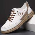 sneakers casual da uomo bianche e beige con lacci e comoda suola in gomma per l'uso quotidiano