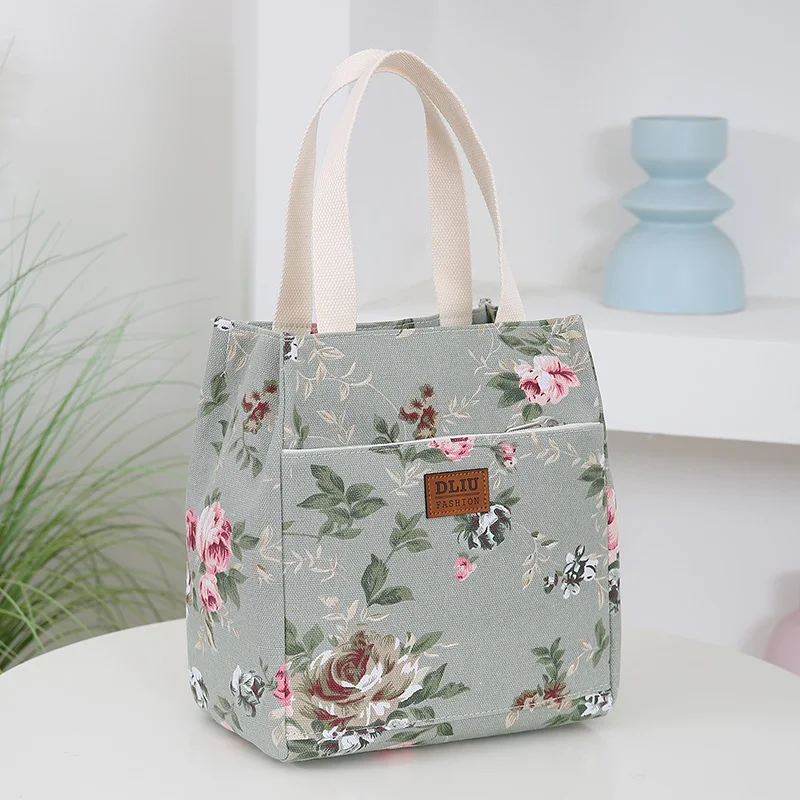 Neue Handtasche aus Segeltuch mit Blumenmuster, tragbare, halbgeschlossene Aufbewahrungstasche für den täglichen Gebrauch mit mehreren Taschen und Reißverschluss, Bento-Tasche Image