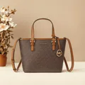 Michael Kors Ole Jet Set da viaggio ultra piccolo con stampa in PVC e borsa tote a tracolla da donna in pelle