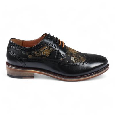 Justin Reess Herren-Brogue-Schuhe aus schwarzem Leder mit Blumenmuster - Ross Image