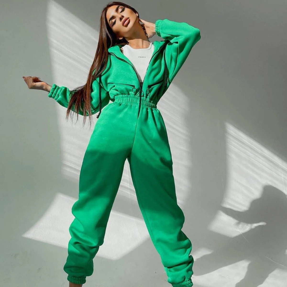 Tuta da donna Casual elegante a maniche lunghe tuta da donna tinta unita con cappuccio pagliaccetto autunno moda scollo a V tasca con cerniera tuta