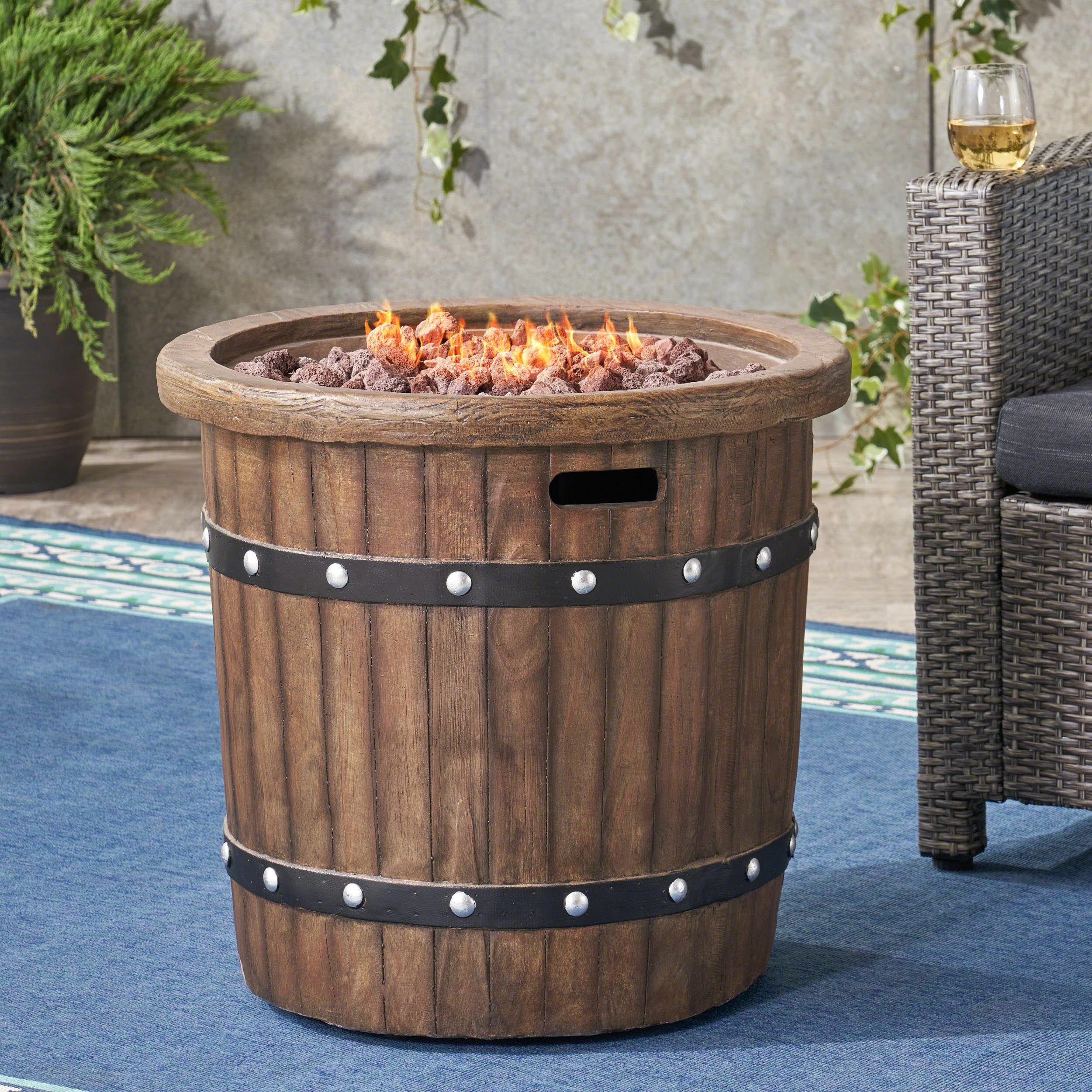 Roomfitters Round Outdoor Fire Pit Table with Barrel-Style Magnesium Oxide Design, Rustic Patio Accent