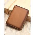 Per uomo A portafoglio Portafoglio porta carte di credito Pelle Cuoio Ufficio Casual / quotidiano Tasche multiple Massima capacità Blocco RFID Tinta unica Sfregamento del colore Marrone chiaro Nero