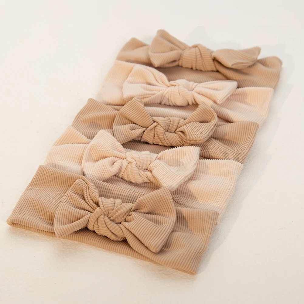 Ins Creme beige gerippte Schleife Stirnbänder Baby Mädchen elastische Haar bänder Neugeborene Kopf wickel koreanische Säugling Kinder Haarschmuck Image
