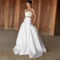Gonna da sposa da sposa in raso di seta bianca di alta qualità con tasche gonna a pieghe da pavimento per donna faldas para mujeres