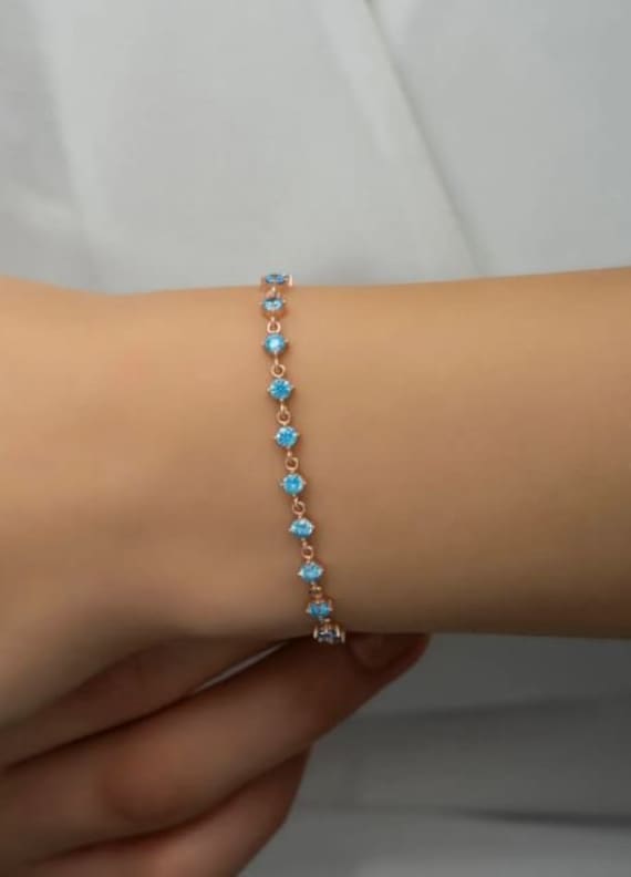Bracciale con acquamarina, bracciale con acquamarina e oro, bracciale con pietra portafortuna di marzo, bracciale tennis con acquamarina blu, braccial