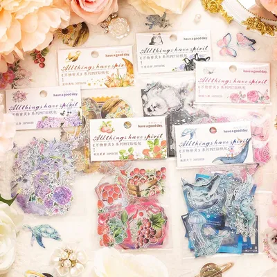 30 Blatt Aufkleberpackung, Lünette, Schmetterling, Katze, Hund, Blume, Planet, glänzende Laser-Silber-PET-Collage-Aufkleber, 6 Stile Image