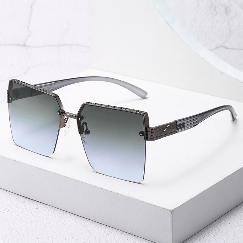 Neue rahmenlose, quadratische, UV-beständige Sonnenbrille, trendige und modische Straßenfotografie, vielseitige Auto-Sonnenbrille 1205 Image