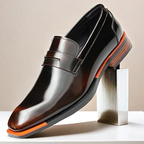 Schwarze Slipper aus hochwertigem Rindsleder für Herren mit kontrastierendem orangefarbenem Akzent, formeller Stil für Business und besondere Anlässe Image