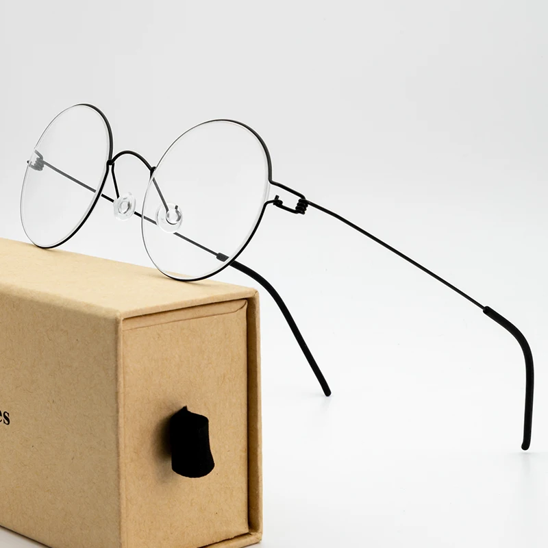 Dünne Rand Runde Schraubenlose Rahmen Frauen Männer Ultraleicht Air Titan Brillen Korea Pate Gläser Ultra Licht Design Brillen Image