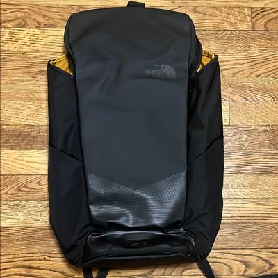 The North Face Bags | The North Face Black Backpack With Modern Design And Durable Material | Color: Black/Yellow | Size: Os