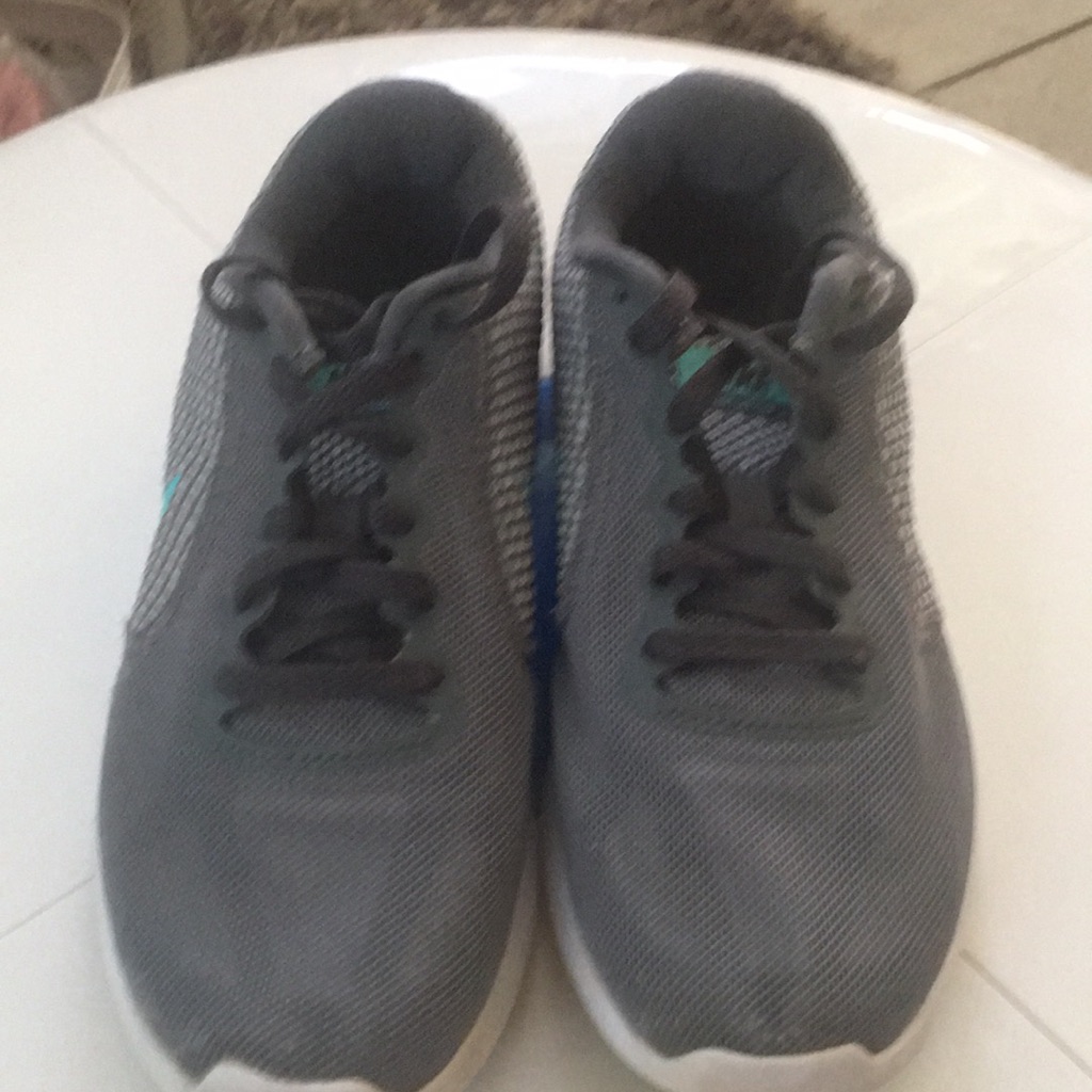 Nike Shoes | Woman’s Grey/White Revolution Nike Sneakers With Greenish Blue Nike Symbol. | Color: Gray/White | Size: 6