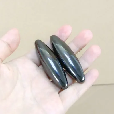 Magnetspiel Steine Physik für die Schule Ein Paar ovaler Magnetstein Lustiges summender Image
