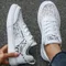 Scarpe da ginnastica da donna Scarpe vulcanizzate di moda per donna Scarpe basse di alta qualità