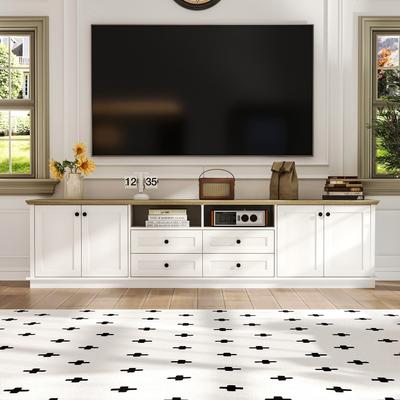 Stylish Entertainment Console TV Stand: Modern Color Scheme and Ample Storage for Organized Media Spaces