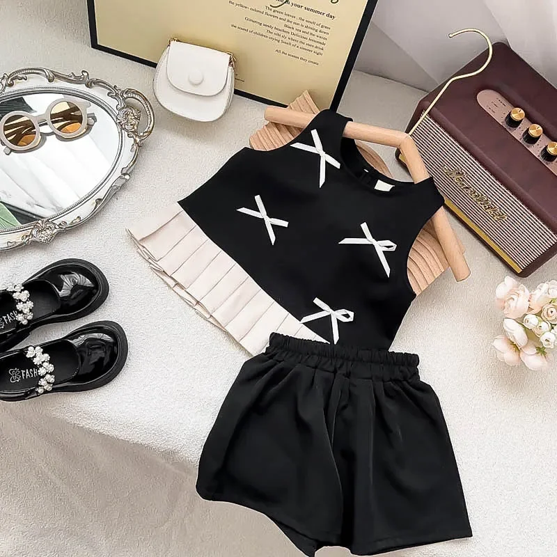 Neue Sommer Mädchen Kleidung Set Gespleißt Weiß Bogen Dekoration Schwarz Ärmelloses Top + Shorts 2Pcs Anzug Für 3-8Y mode Täglichen Outfit Image