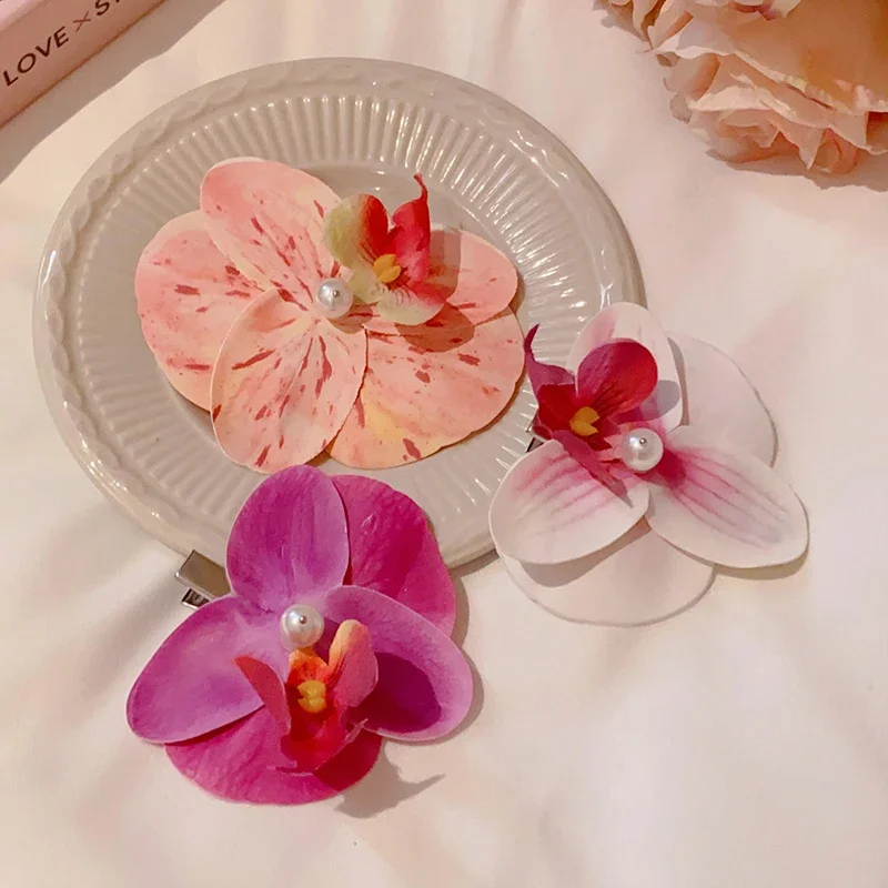 1/2 Stücke Bunte Schmetterling Orchidee Blume Simulation Perle Entenschnabel Haarspangen für Frauen Fairycore Charms Kopf Zubehör Sets Image