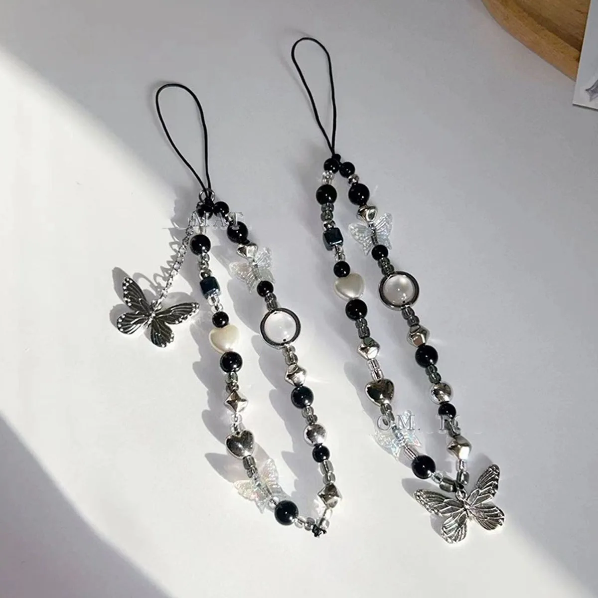 Japanische und koreanische würzige Mädchen Schmetterling schwarz und weiß Handy-Kette ccd Kamera einzigartige Perle hängen Seil Kette Image