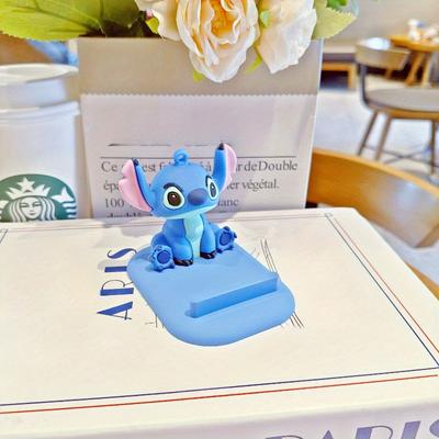 TEMU 1pc Stitch Cartoon Desktop Stand, Cute Sitting , Lazy Phone Holder, Pvc Material, Desk Accessory For Mobile Devices, Office Decor, Cute Office Supplies Image