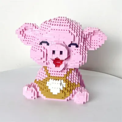 Glück lächelndes rosa Schwein Micro Mini Bausteine Spielzeug-Handheld-Spiel, Desktop-Dekoration, Image