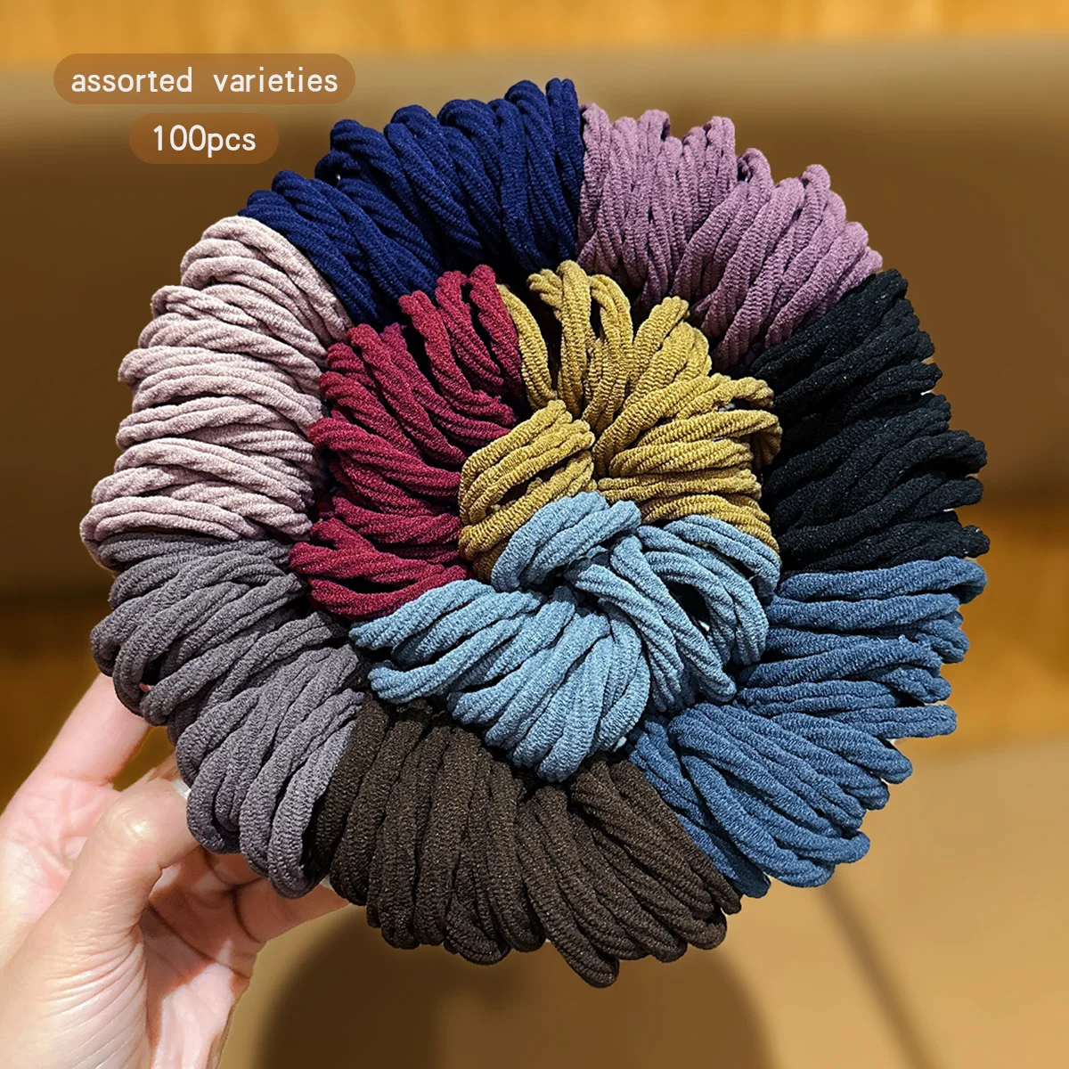 100 hochelastische und langlebige Haarringe mit einfachen Gummibändern, geeignet für den täglichen Gebrauch als Haarschmuck (die Box ist ein Sho Image