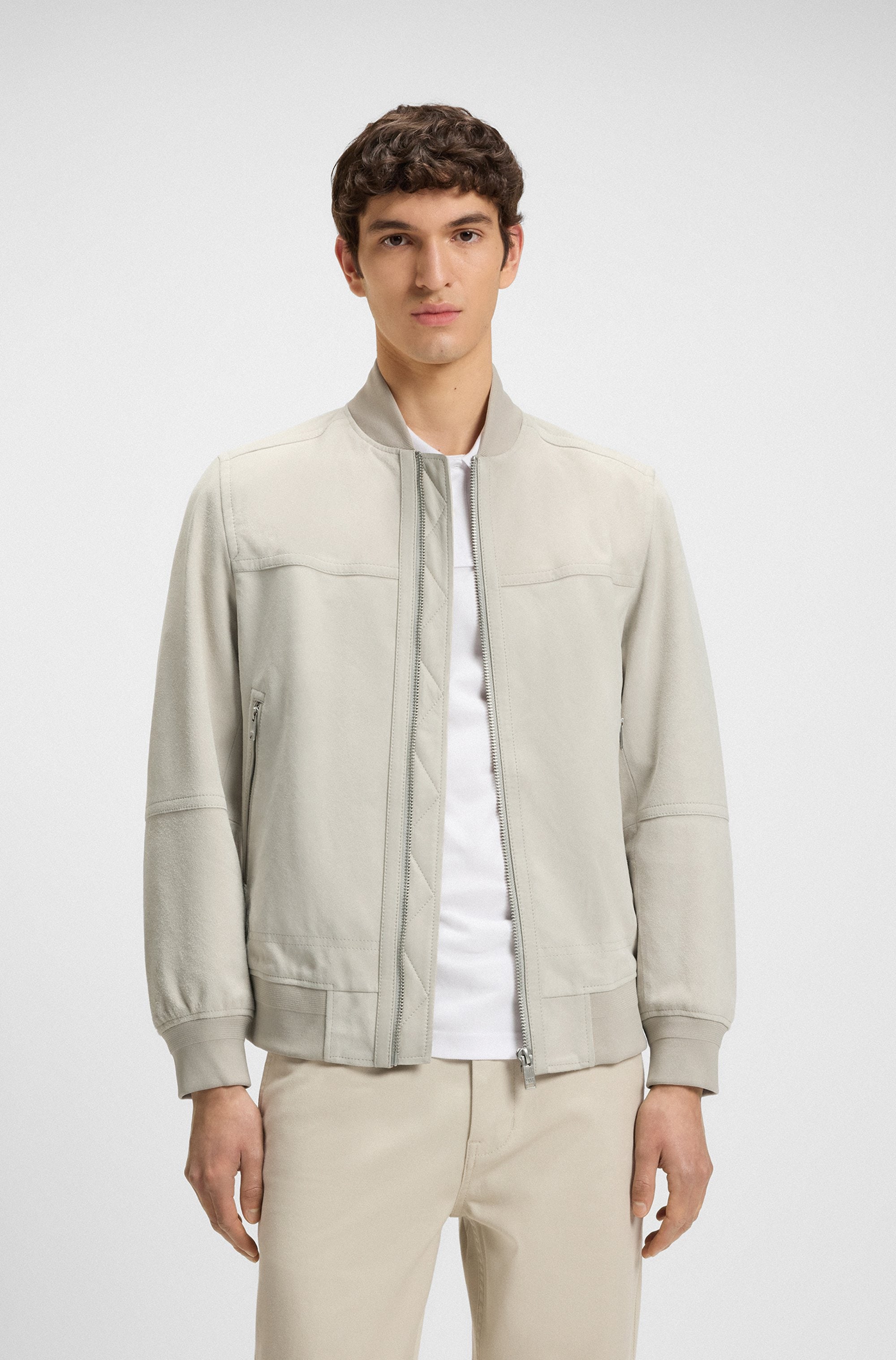 Lederjacke BOSS ORANGE "Johice", Herren, Gr. 50, beige (light beige271), Obermaterial: 100% Ziegenleder, unifarben, regular fit hüftlang, Rundhals, Flachstrickbündchen, Jacken, aus weichem Ziegennappaleder Premium Herrenmode Leather Blouson Bomber