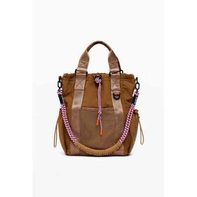 Multi-position backpack with drawstrings