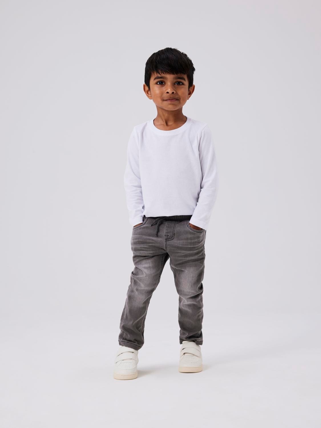 Schlupfjeans NAME IT "NMMRYAN SLIM SWE JEANS 2472-TH NOOS", Jungen, Gr. 110, N-Gr, blau (medium grau denim), Denim/Jeans, Obermaterial: 70% Baumwolle, 27% Polyester, 3% Elasthan, unifarben, regular fit lang, Jeans, im Jogging Style Image