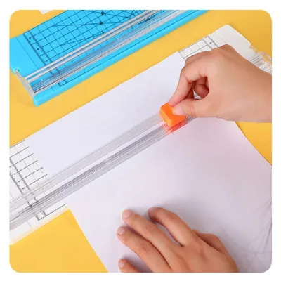 Kleiner tragbarer Papierschneider, bidirektionaler Kunststoff-Papierschneider, handgefertigtes Schülertagebuch, verschiebbare Papierschneider Image