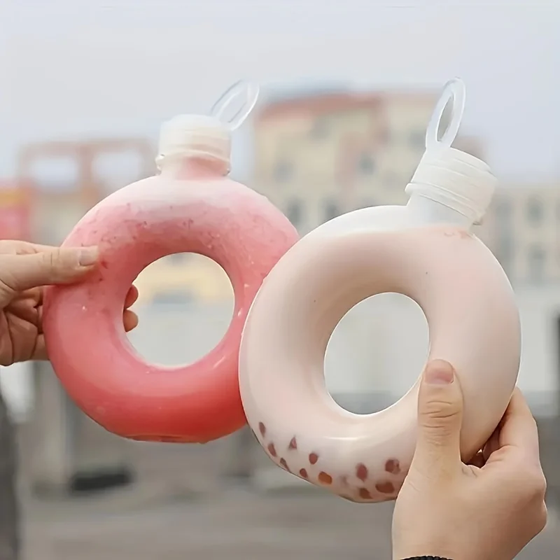 1 Stück Ozzy Donut-förmiger Wasserbecher, tragbare auslaufsichere Milchteeflasche, geeignet für Schule, Zuhause und Outdoor-Sportarten Image