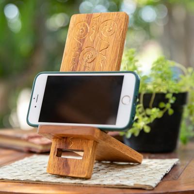'Hand-Carved and Painted Wood Phone Stand with Spiral Motifs'