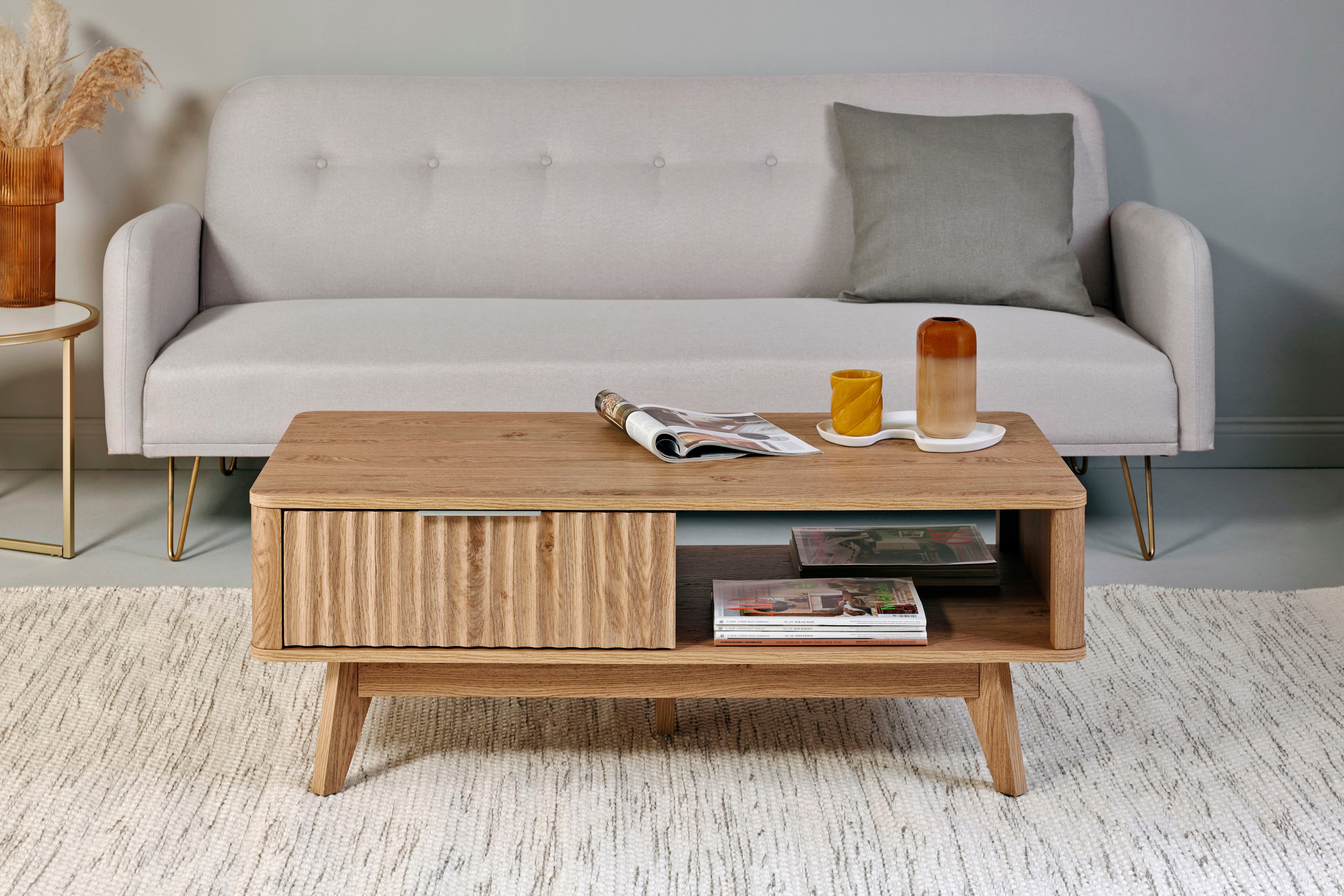 Couchtisch JAHNKE "WAVE COFFEE SK", braun (montana eiche, montana eiche, montana eiche), B:110cm H:44cm T:55cm, Tische, Couchtisch, Retro-Stil, Stauraum, Fronten in raffiniertem Wellendesign Image
