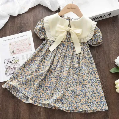 Sommer Neue Freizeit Landschaft Stil Mädchen Kleidung Revers Bogen Blase Hülse Prinzessin Kleid Floral für Kinder im Alter von 2-7 Image