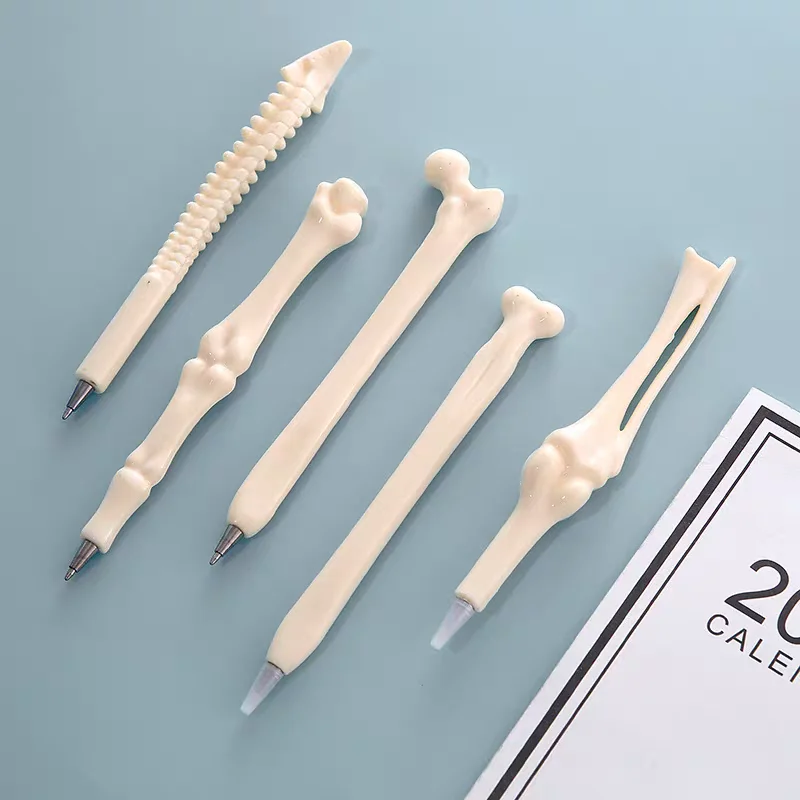 Lustiger Kugelschreiber mit blauer und schwarzer Tinte, kreatives Design, simulierter Knochenstifte, Schule, Büro, Schreibzubehör, Geschenk, Schreibwaren Image