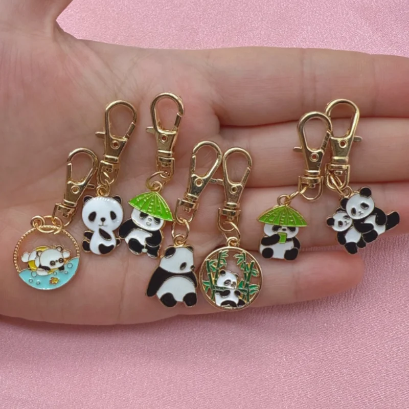 7-teiliger Tropföl-Panda-Schlüsselanhänger aus Legierung, geeignet für Taschen- und Handyzubehör, die beste Wahl für Geschenke Image