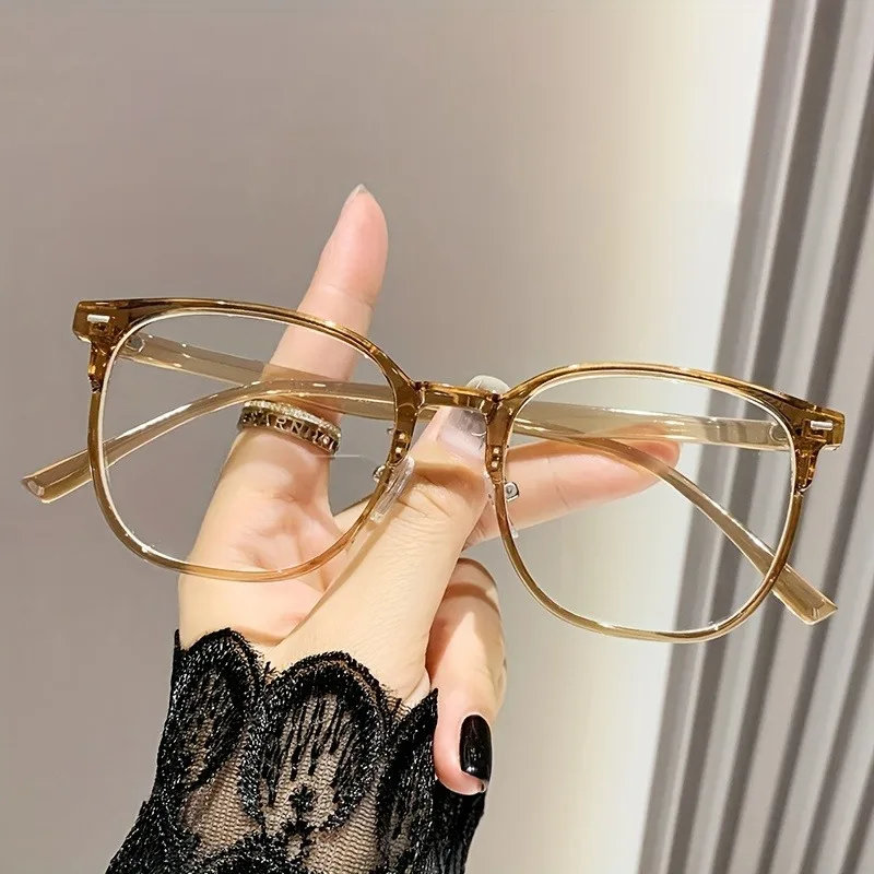 Vintage-Brille mit quadratischem Rahmen für Männer und Frauen. Y2K inspiriert modische Brillen-Foto-Pops, perfekt für Partys Image