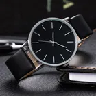 Marque de luxe hommes montres mode métal cadran rond analogique Quartz montre-bracelet pour hommes femmes bracelet en cuir décontracté Simple mâle horloge