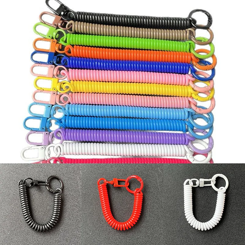 Noter Neuer Kunststoff-Federseil-Schlüsselanhänger, Telefonleitung, Anti-Verlust-Teleskop-Schlüsselanhänger, 3-Farben-Großhandel, Doppelkreis-Schlüsselanhänger Image
