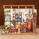 Kit di costruzione in miniatura in legno fai-da-te Case delle bambole della libreria di Tom con mobili Mini case delle bambole Casa per regali di compleanno degli amici