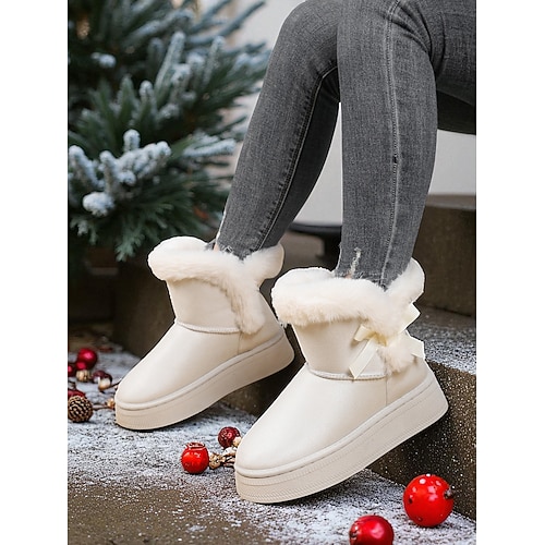 Weiße Winterstiefel zum Hineinschlüpfen mit Pelzbesatz und Schleifendetail für Damen, stylische, gemütliche Schneestiefel für kaltes Wetter und den Urlaub Image