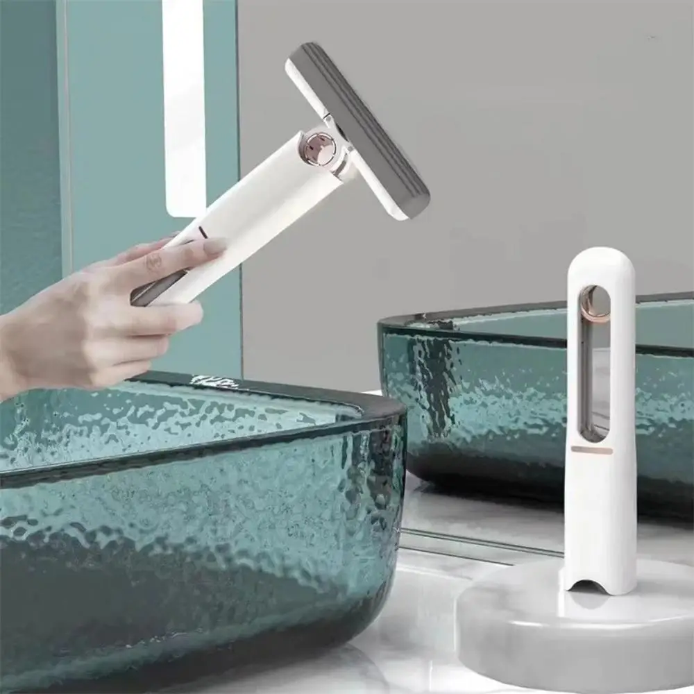Neuer tragbarer Mini-Quetschmopp, Haushaltsreinigungswerkzeug, geeignet für die Reinigung von Küchen, Autos, Schreibtisch, Reinigungsmopp aus Glas und Schwamm. Image