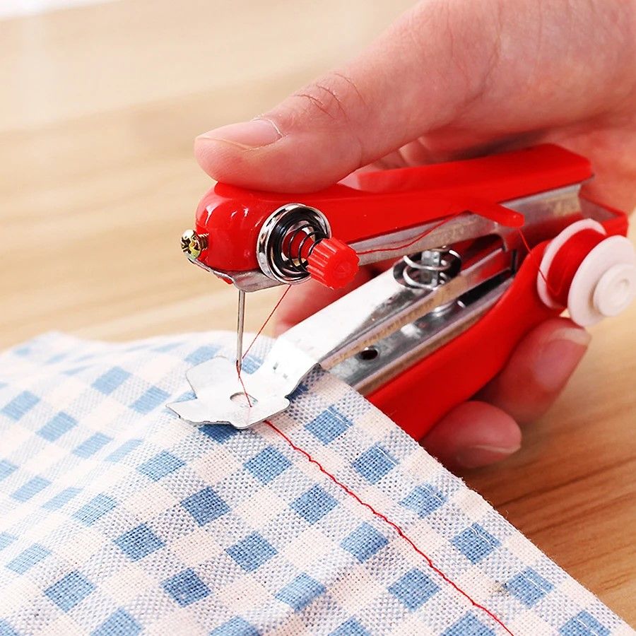 TravellerStitch Portable Mini Sewing Machine Your Ultra compact Home & Travel Sewing Companion. TravellerStitch Portable Mini Sewing Machine Your Ultra compact Home & Travel Sewing Companion.