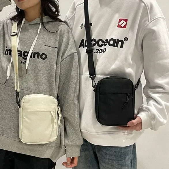 Mode Nylon nouveau décontracté Simple téléphone sac petit épaule sac à bandoulière nouvelle mode tendance sport sacs à bandoulière pour hommes et femmes