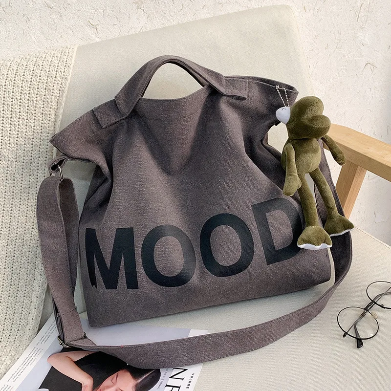 Top Canvas Tasche Jugend Männer Umhängetaschen Große Kapazität Handtaschen Brief Gedruckt Umhängetaschen für Frauen Studenten Schultaschen Image