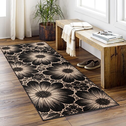 Läuferteppich mit floralem Muster in Schwarz und Beige, strapazierfähig und pflegeleicht, ideal für Flur, Küche oder Eingangsbereich. Image